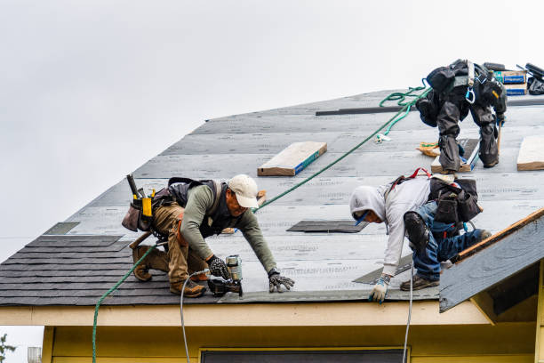 Professional Gutter Installation technician working in Athens, IL